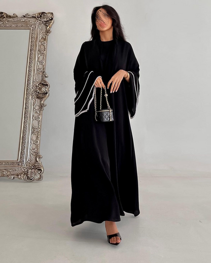 Nadine Al Raqi - Abaya
