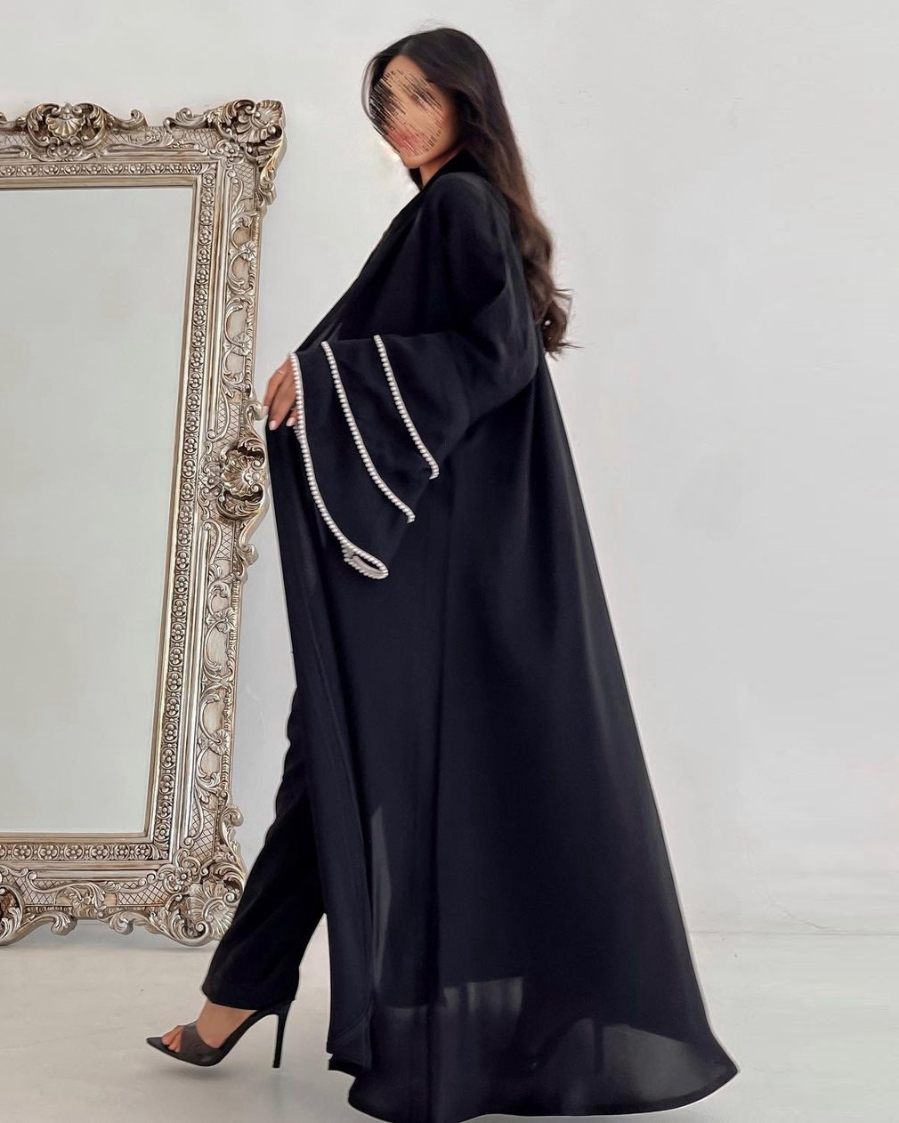 Nadine Al Raqi - Abaya